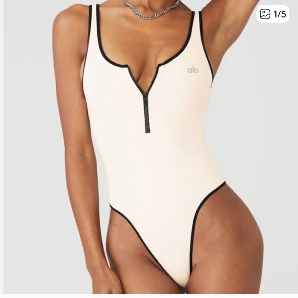 ALO Yoga Cream Bodysuit with Black Trim and Front Zip